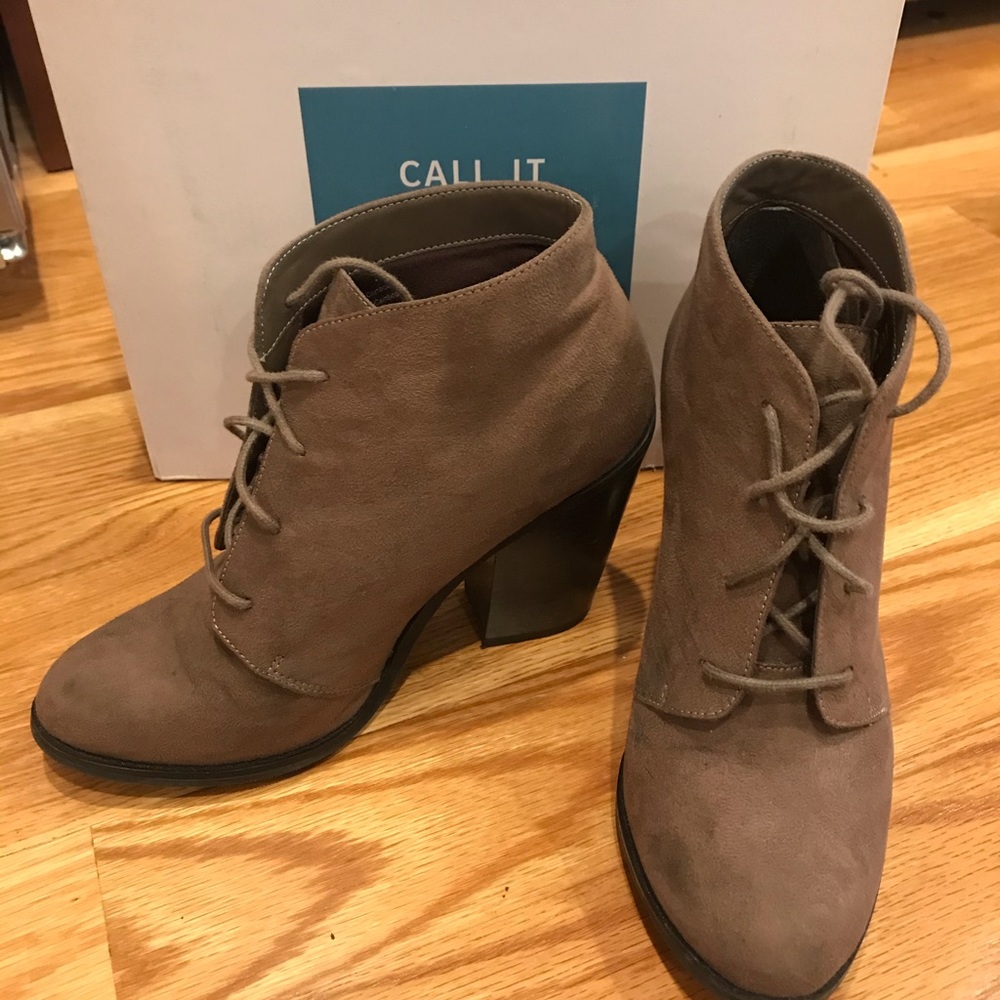 Tan lace up, heeled booties. Size 8.